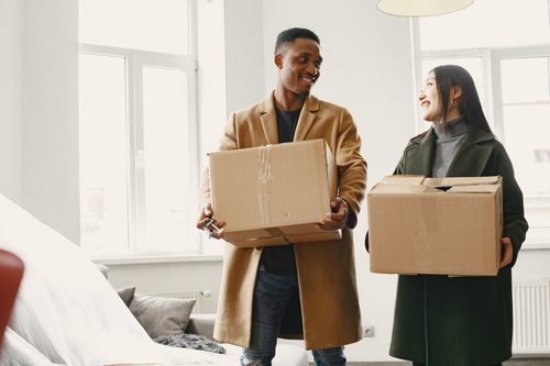 Couple moving into their new home